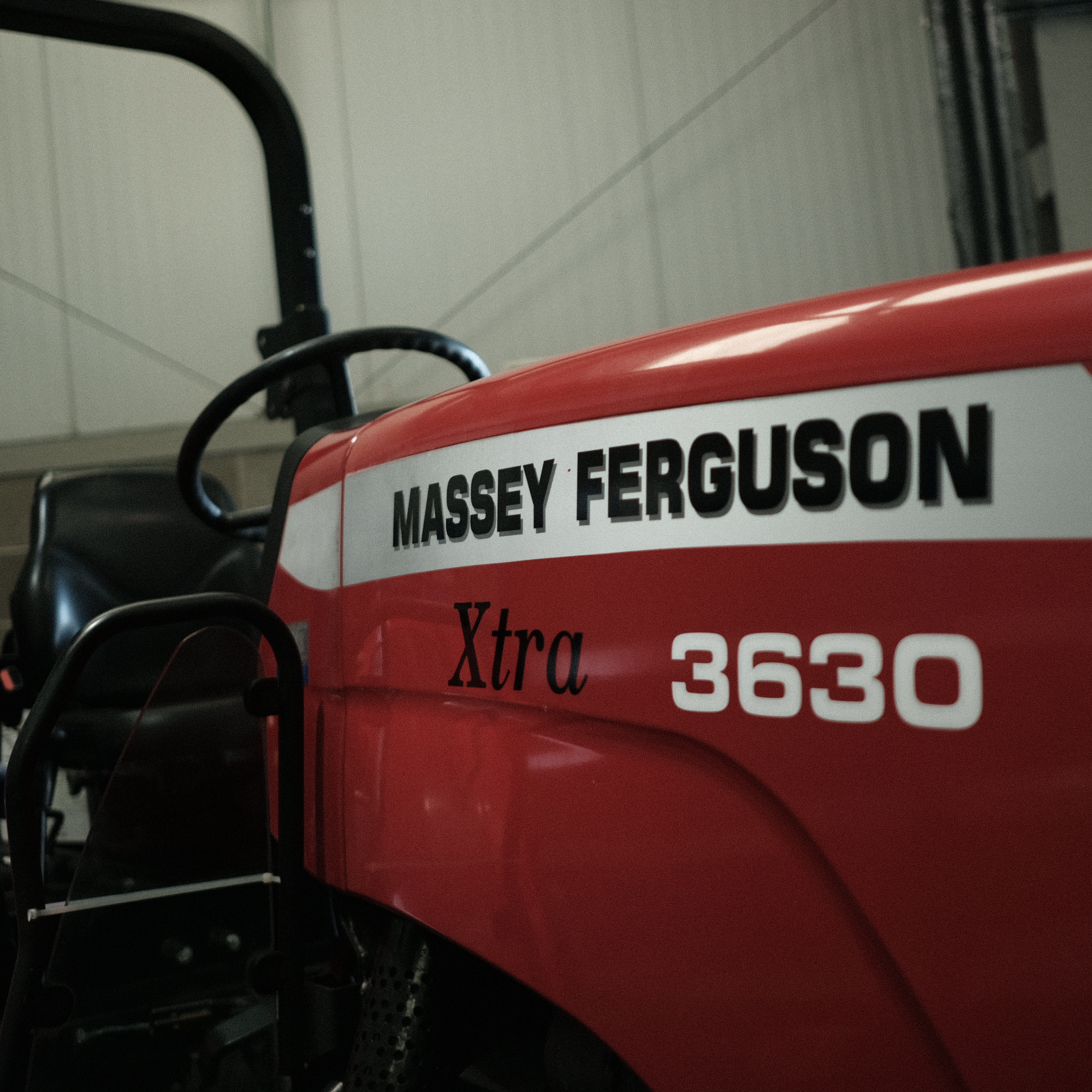 auction car lot with attendees and EASTER WEEKEND! banner over the top